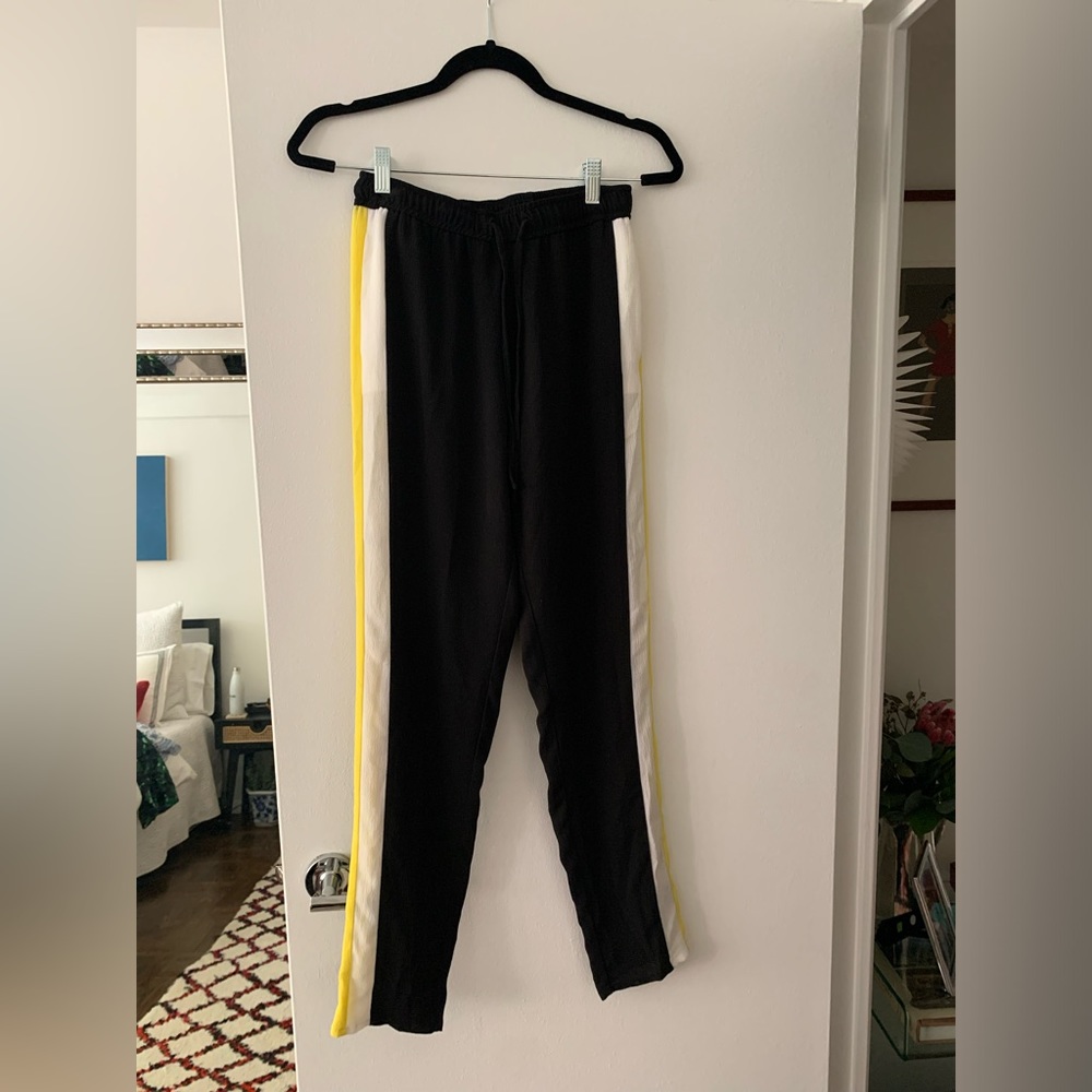 Black, white, and yellow trousers from blugirl - Bluemarine. Made in Italy